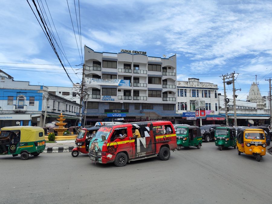 top reasons to visit Kenya local matatu buses and tuk tuks